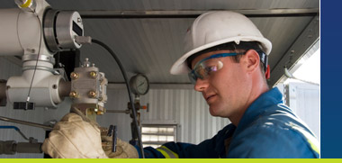 Technician calibrating a pressure transmitter